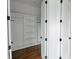 Well-organized closet featuring built-in shelves, rods, and cabinets at 115 Augusta Ln, Shelby, NC 28150