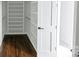 Walk-in closet with built-in shelving providing ample storage and organization at 115 Augusta Ln, Shelby, NC 28150