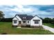 Beautiful two-story home with a well-manicured lawn and inviting front porch at 115 Augusta Ln, Shelby, NC 28150