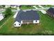 Back exterior elevation shows roof and back porch at 115 Augusta Ln, Shelby, NC 28150