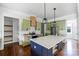 Well-designed kitchen with a large island, green cabinets, and modern lighting at 115 Augusta Ln, Shelby, NC 28150