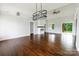 Spacious living room with hardwood floors, fireplace, and a sliding glass door at 115 Augusta Ln, Shelby, NC 28150