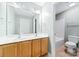 Bright bathroom features double vanity with white countertop and tiled floors at 12002 Cobham Ct, Huntersville, NC 28078