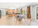 Eat-in kitchen features granite countertops, tile floors and stainless steel appliances at 12002 Cobham Ct, Huntersville, NC 28078