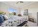 Bright bedroom with large window offering natural light and neighborhood views at 12410 Franklin Park Ln, Huntersville, NC 28078