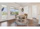 Bright breakfast nook with large windows, a round table, and cozy seating at 12410 Franklin Park Ln, Huntersville, NC 28078