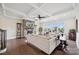 Comfortable living room with a stone fireplace, coffered ceiling, and ample natural light at 12410 Franklin Park Ln, Huntersville, NC 28078