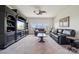 Spacious living room featuring built-in shelving, large windows, and comfortable seating at 12410 Franklin Park Ln, Huntersville, NC 28078