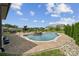 Stunning backyard oasis featuring a gunite pool, and lush landscaping at 12410 Franklin Park Ln, Huntersville, NC 28078
