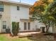 Cozy back patio with double doors and mature trees in a peaceful setting at 146 Rapids Rd, Fort Mill, SC 29715