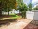 Private backyard with a patio and lush greenery, ideal for outdoor entertaining at 146 Rapids Rd, Fort Mill, SC 29715