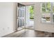 Bright entryway with wood-look floors and a view to the outside at 146 Rapids Rd, Fort Mill, SC 29715