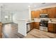 Well-equipped kitchen featuring stainless steel appliances and warm wood cabinets at 146 Rapids Rd, Fort Mill, SC 29715