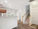 Open concept living space with staircase and modern flooring at 146 Rapids Rd, Fort Mill, SC 29715