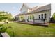 Back yard deck with a hot tub and lots of room for outdoor furniture at 15103 Cimarron Hills Ln, Charlotte, NC 28278