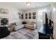 Versatile bonus room with sports decor, comfortable seating, and ample space for entertainment or relaxation at 15103 Cimarron Hills Ln, Charlotte, NC 28278