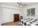 Bedroom features wood flooring, closet and a window providing natural light at 1602 Eagles Pl # J103, Rock Hill, SC 29732