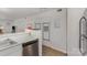 Bright kitchen featuring stainless steel dishwasher, and white cabinetry at 1602 Eagles Pl # J103, Rock Hill, SC 29732