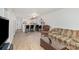 Spacious living room with updated flooring and modern decor at 1602 Eagles Pl # J103, Rock Hill, SC 29732