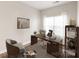Cozy office space featuring a work desk, chair, and natural lighting from the bright window at 16344 Redstone Mountain Ln, Charlotte, NC 28277