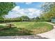 Scenic view of the park featuring mature landscaping and a shaded picnic area at 16344 Redstone Mountain Ln, Charlotte, NC 28277
