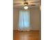 Bedroom featuring hardwood floors, neutral paint, and window at 1721 9Th Ne Ave, Hickory, NC 28601