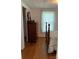 Comfortable bedroom with hardwood floors, dresser, closet, and window at 1721 9Th Ne Ave, Hickory, NC 28601