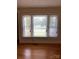 Bedroom has a nice view of the outside with hardwood floors at 1721 9Th Ne Ave, Hickory, NC 28601