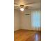 Bedroom with natural light, ceiling fan, and hardwood floors at 1721 9Th Ne Ave, Hickory, NC 28601