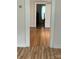 Bedroom with hardwood floors and natural light from a large window at 1721 9Th Ne Ave, Hickory, NC 28601
