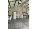 Functional garage with storage cabinets, shelving, and work area at 1721 9Th Ne Ave, Hickory, NC 28601