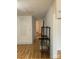 Hallway with hardwood floors connecting to other rooms with bright walls at 1721 9Th Ne Ave, Hickory, NC 28601