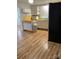 Kitchen featuring hardwood floors, white cabinets, and a rolling butcher block island at 1721 9Th Ne Ave, Hickory, NC 28601