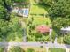 Overhead view of well-kept home with verdant landscaping and a private pool at 19924 Floral Ln, Cornelius, NC 28031