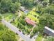Aerial view of well-kept home with verdant landscaping and a private pool at 19924 Floral Ln, Cornelius, NC 28031