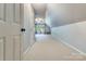 Bright bonus room showcasing neutral carpet, ceiling fan, and natural light at 2043 Shadwell Ct, Gastonia, NC 28056
