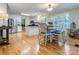 Bright kitchen with stainless steel appliances, white cabinets, and an adjacent dining area at 2043 Shadwell Ct, Gastonia, NC 28056