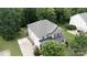 An aerial view reveals a home nestled among trees and a convenient driveway basketball hoop at 2405 Emma Grace Ln, Rock Hill, SC 29732