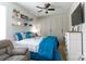 Comfortable bedroom featuring large closets, light decor, and ceiling fan at 2405 Emma Grace Ln, Rock Hill, SC 29732