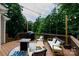 Outdoor deck with a grill, firepit, and comfortable seating, perfect for entertaining at 2405 Emma Grace Ln, Rock Hill, SC 29732