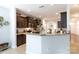 Open kitchen with dark cabinetry, granite countertops, and views into adjacent rooms at 2405 Emma Grace Ln, Rock Hill, SC 29732