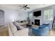 Inviting living room with a cozy fireplace, ceiling fan, and neutral decor at 2405 Emma Grace Ln, Rock Hill, SC 29732