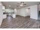 Spacious living room featuring hardwood floors, and an open kitchen at 2583 Watson Dr, Lancaster, SC 29720