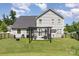 Backyard view of home with a patio and a pergola at 2606 Cheverny Pl, Concord, NC 28027