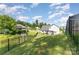 Enjoy a private fenced backyard, complete with a pergola, perfect for outdoor activities and relaxation at 2606 Cheverny Pl, Concord, NC 28027