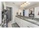 Bright bathroom features double vanity with granite countertop and decorative elephants at 2606 Cheverny Pl, Concord, NC 28027