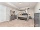 Bedroom showcasing a large bed, modern decor, and an abundance of space at 2606 Cheverny Pl, Concord, NC 28027