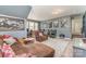 Spacious bonus room complete with game consoles, movie decor and plush seating for leisure and gaming at 2606 Cheverny Pl, Concord, NC 28027