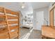 Bedroom with multiple bunk beds, ceiling fan and natural light at 2614 Ocracoke St, Charlotte, NC 28208