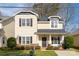 Desirable two-story home featuring traditional architecture, neat landscaping, and a welcoming entryway at 2614 Ocracoke St, Charlotte, NC 28208